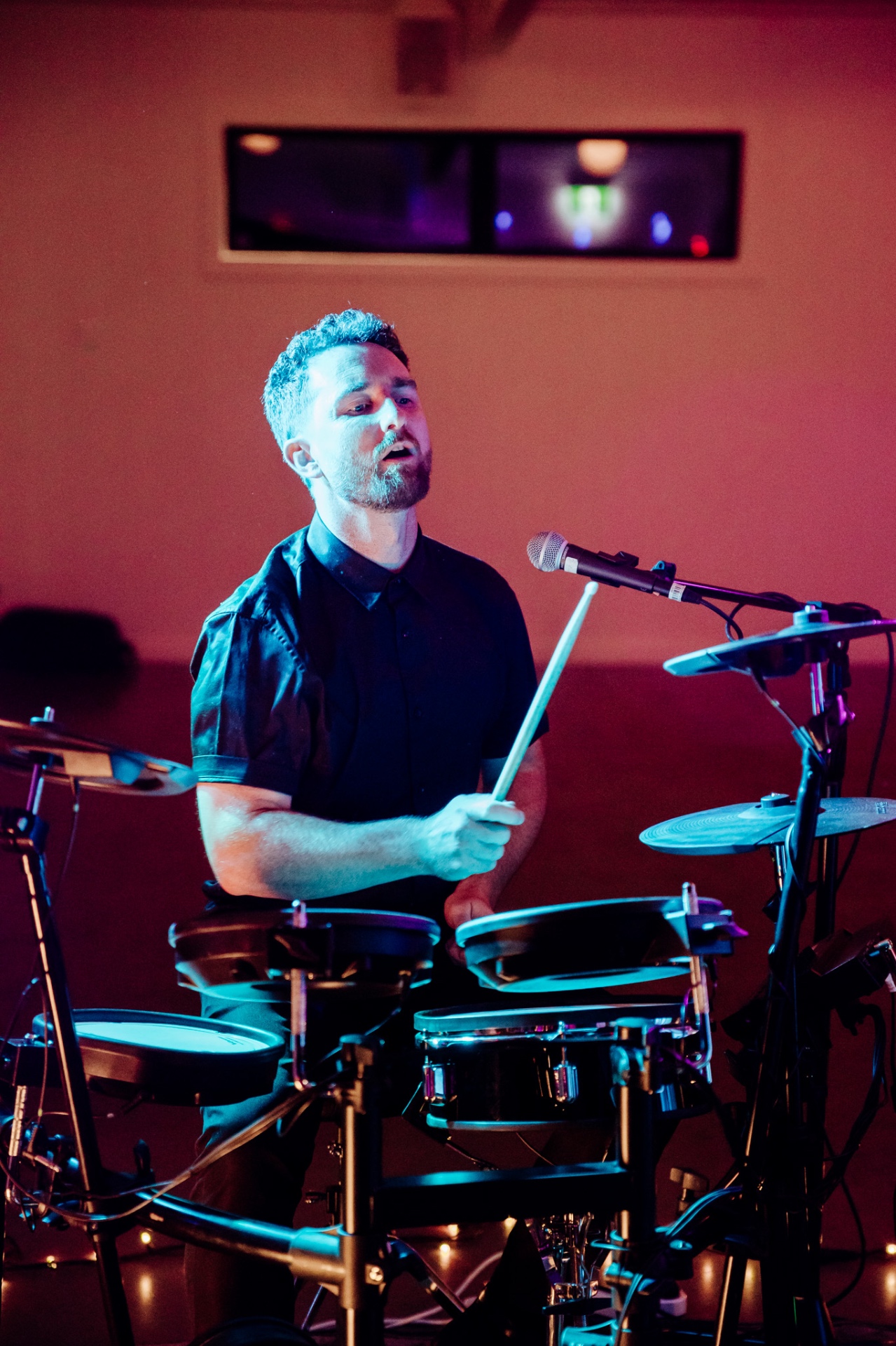 Nick Douch on drums during a Full Send live performance in Auckland